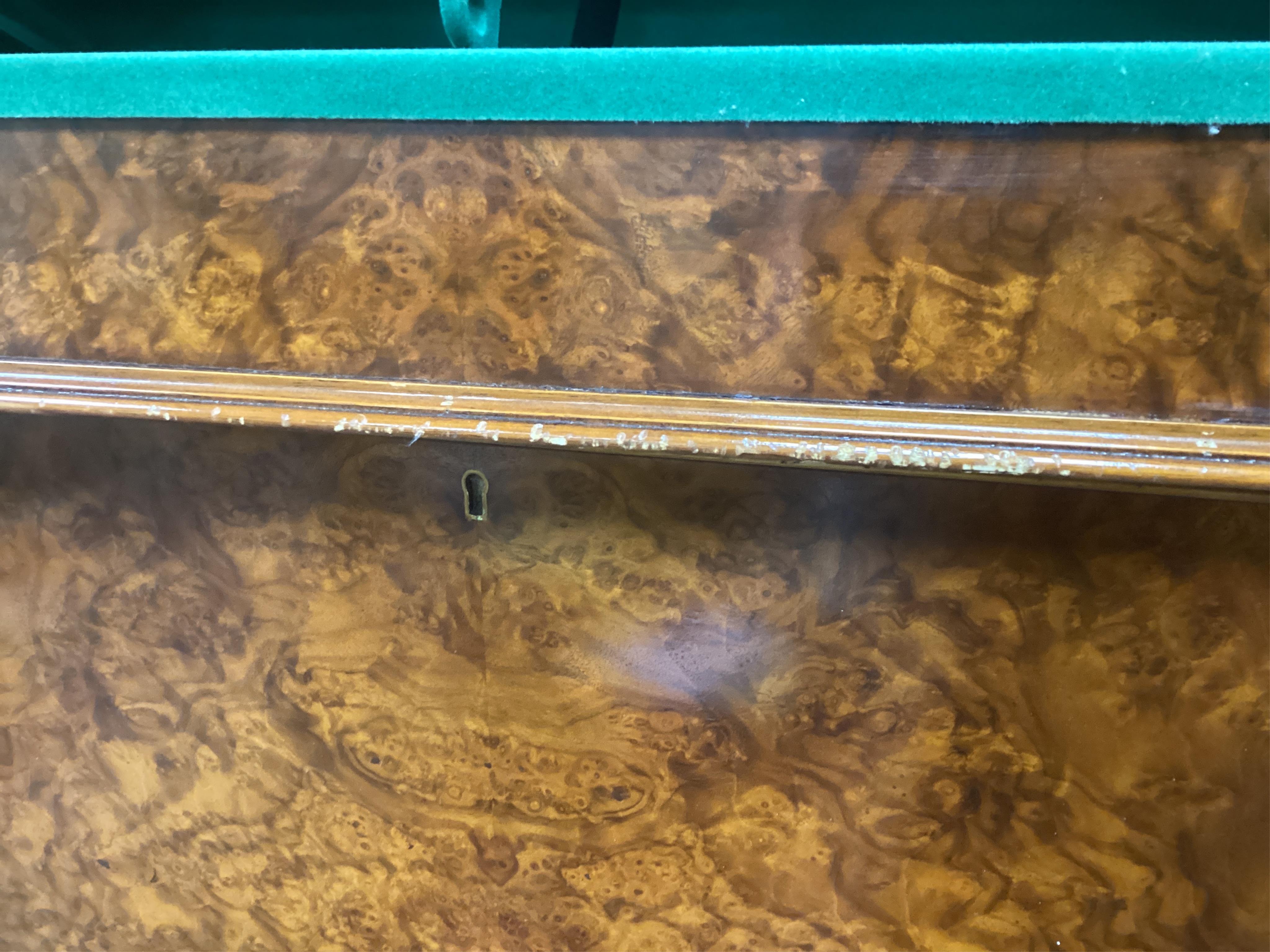 A reproduction burr walnut gun cabinet, width 84cm, depth 40cm, height 157cm. Condition - fair